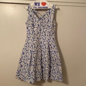 Blue and white floral a-line dress with cross back